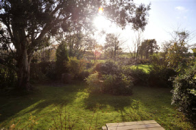 The private and secluded gardens of Orchard End offer views across to Dartmoor and Kit Hill